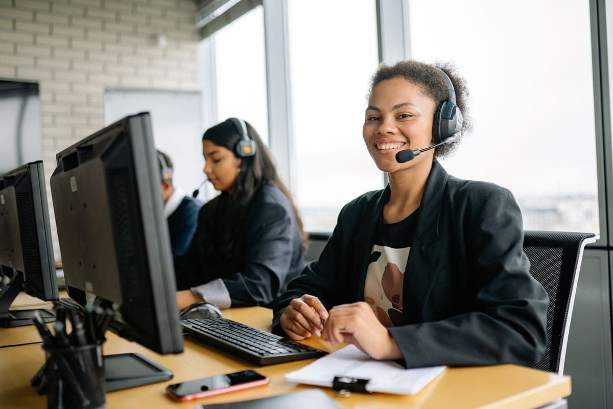 A licensed agent on a call at the CoverageCo office in Lantana, Florida